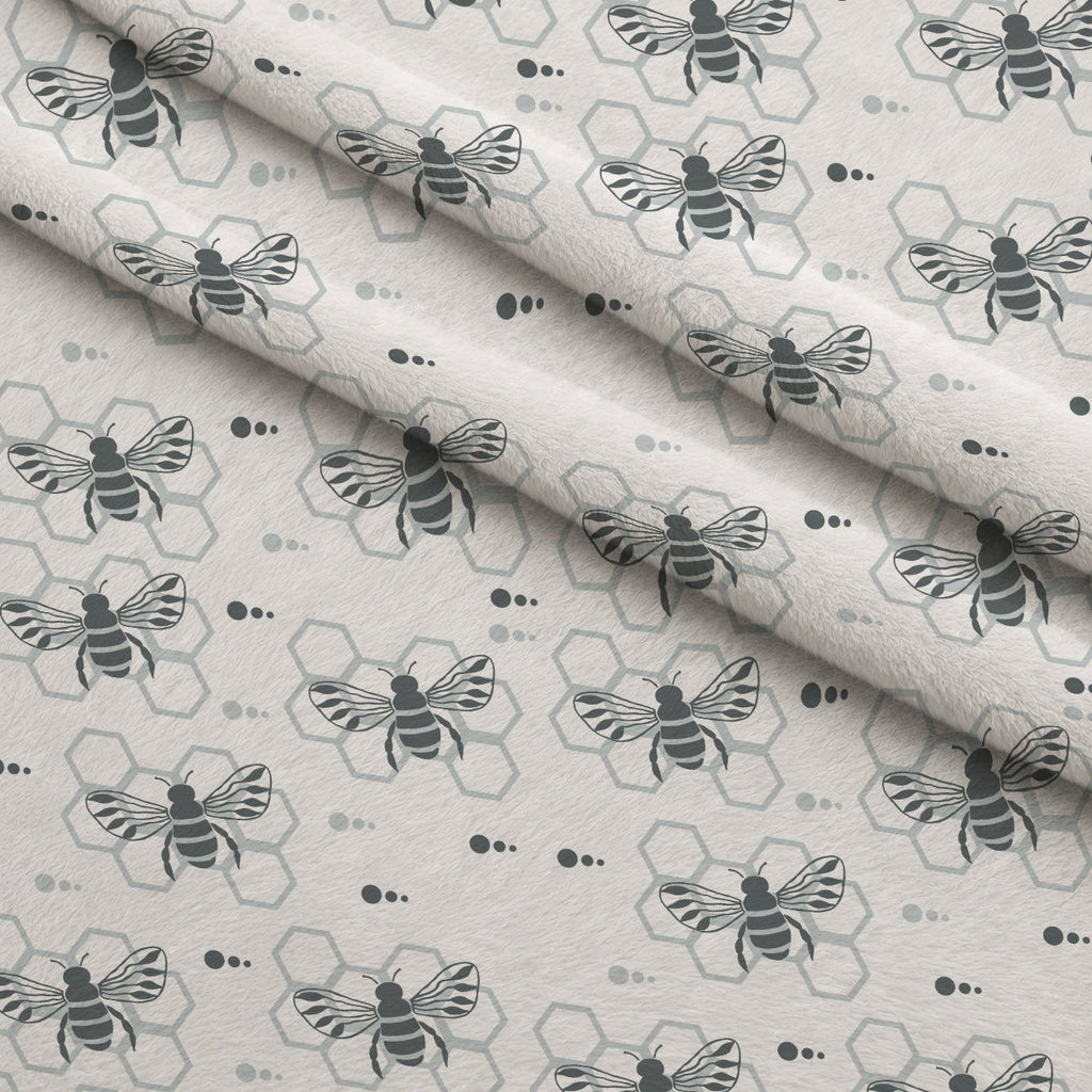 Honeycomb Buzz Pattern 19 Fleece Fabric — fleece fabric folded close-up preview (mv-fleece-v1:lying)