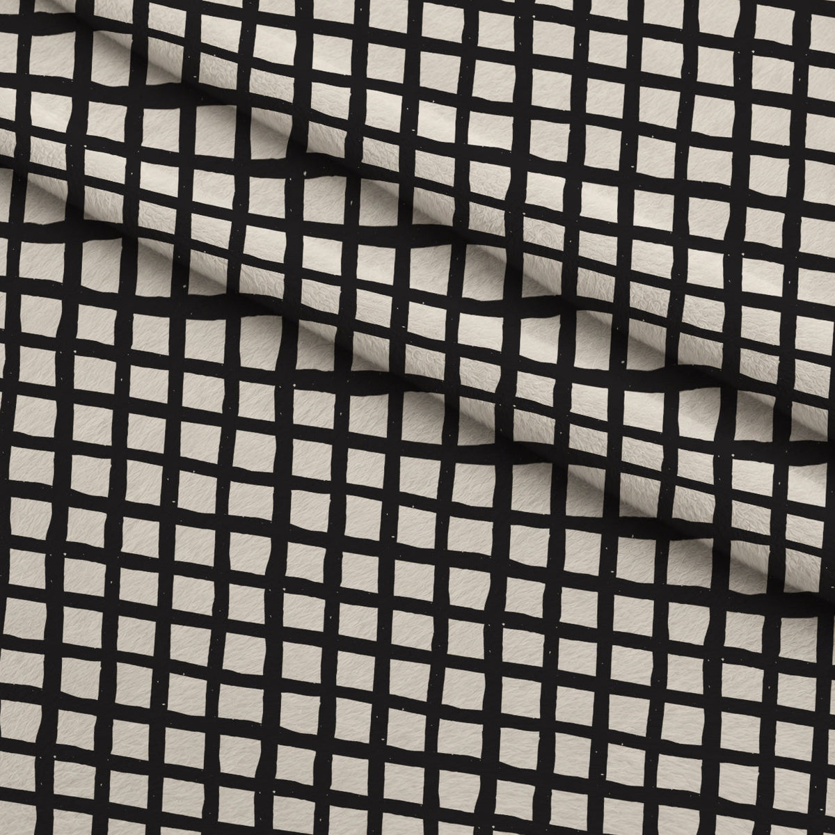 Ink Block Print Pattern 1 Fleece Fabric — fleece fabric folded close-up preview (mv-fleece-v1:lying)