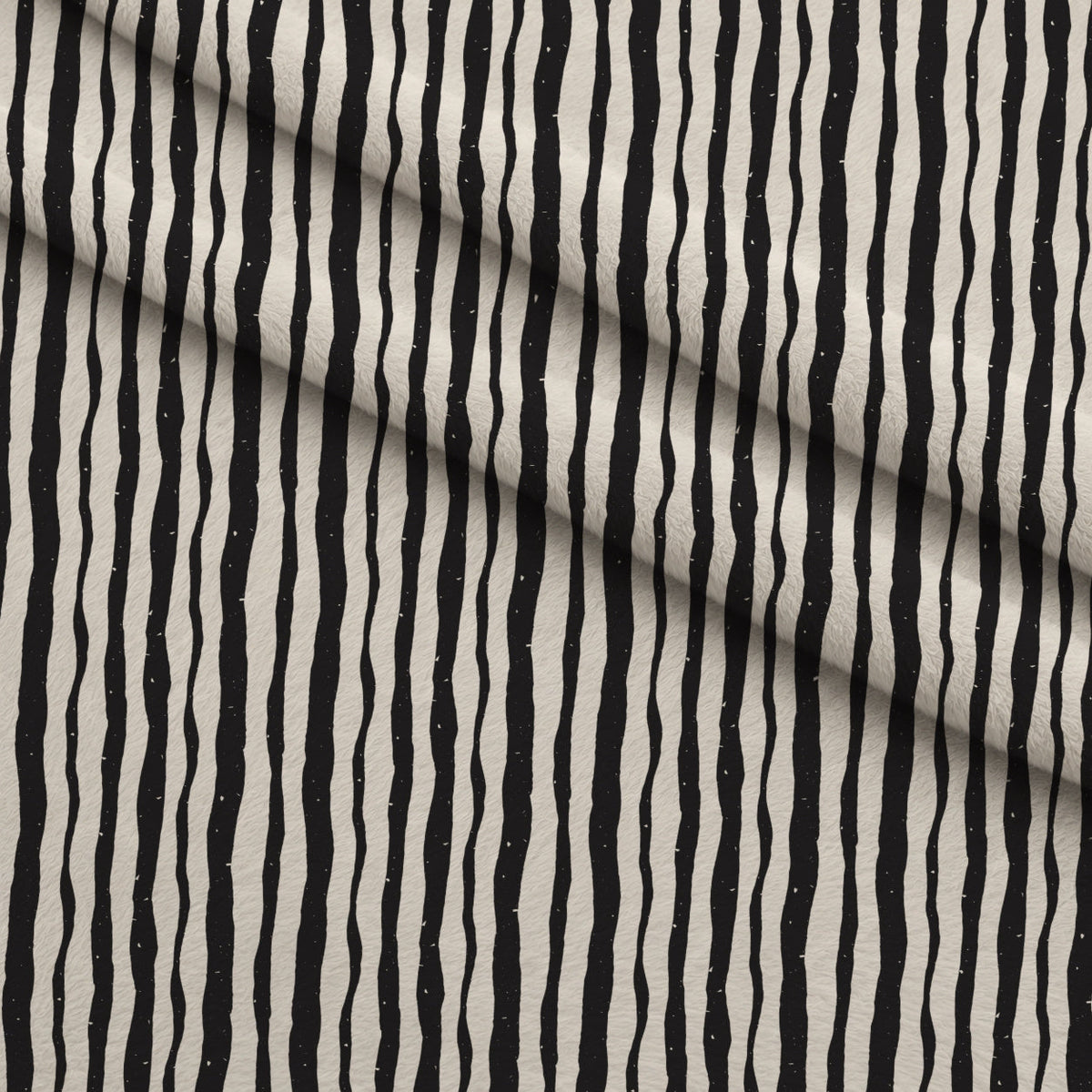Ink Block Print Pattern 9 Fleece Fabric — fleece fabric folded close-up preview (mv-fleece-v1:lying)