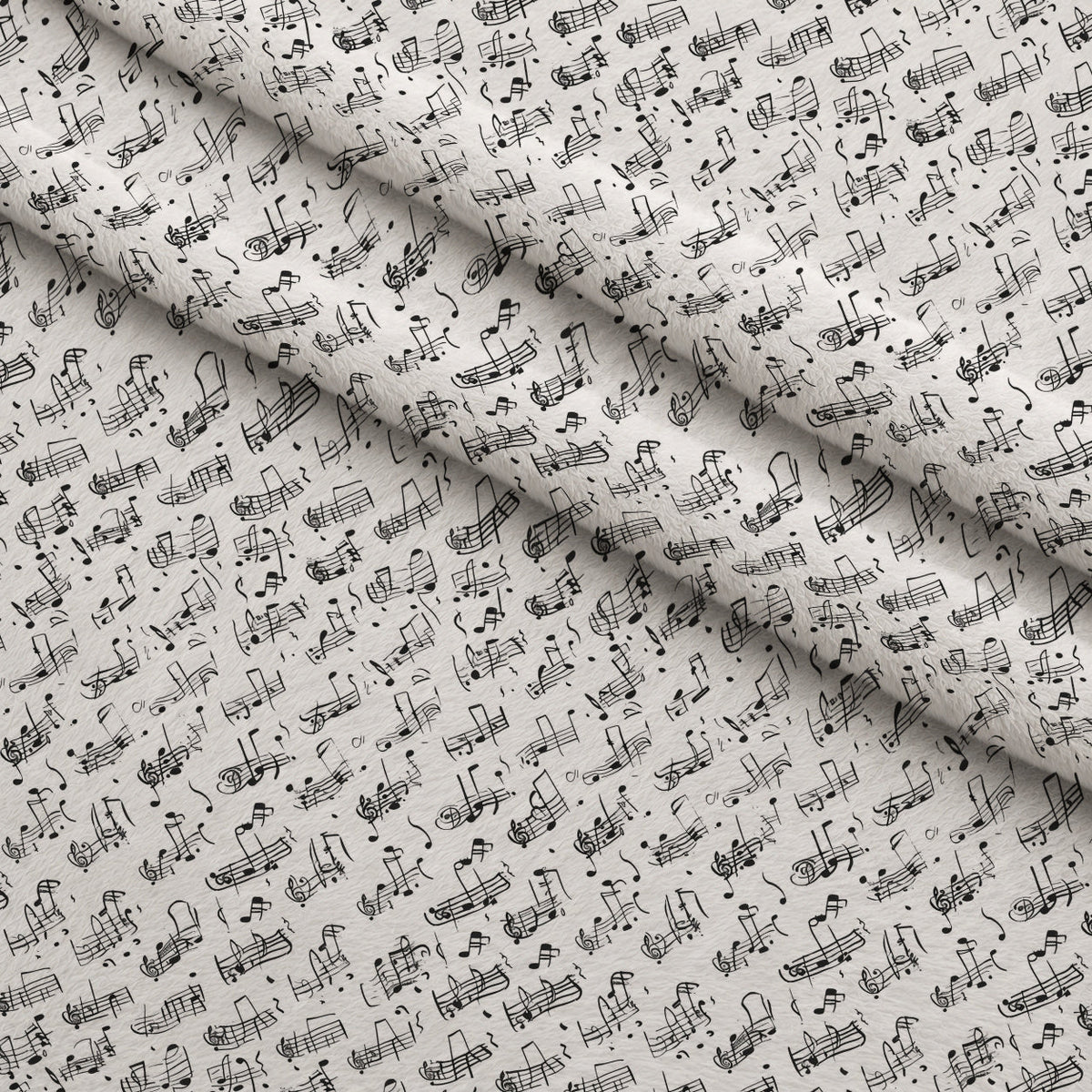 Inked Melodies Pattern 3 Fleece Fabric — fleece fabric folded close-up preview (mv-fleece-v1:lying)