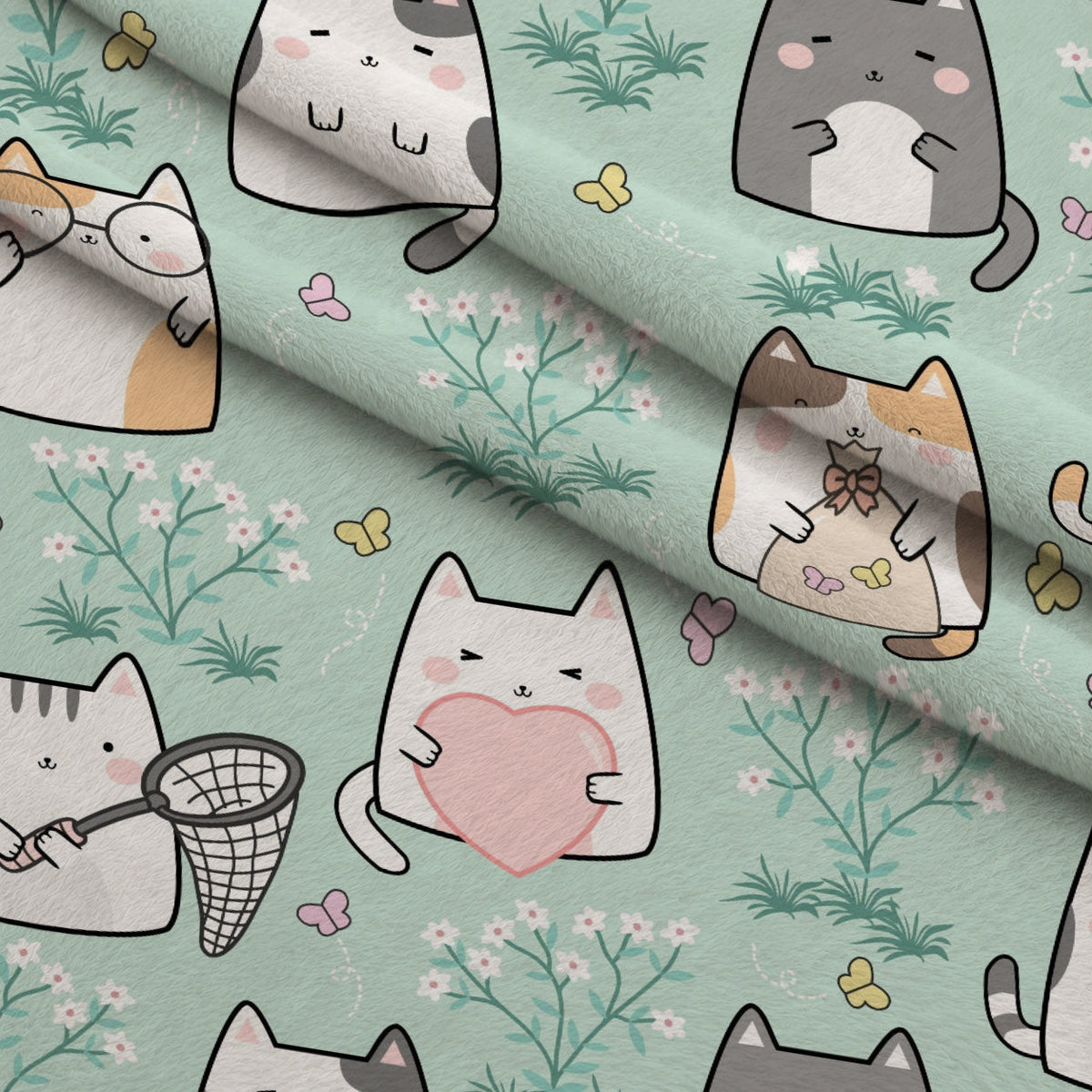 Kawaii Kitty Garden Pattern 8 Fleece Fabric — fleece fabric folded close-up preview (mv-fleece-v1:lying)