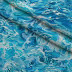 Liquid Sapphire Pattern 10 Fleece Fabric — fleece fabric folded close-up preview (mv-fleece-v1:lying)