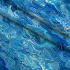Liquid Sapphire Pattern 15 Fleece Fabric — fleece fabric folded close-up preview (mv-fleece-v1:lying)