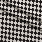 Mad Hatter Harlequin Pattern 11 Fleece Fabric — fleece fabric folded close-up preview (mv-fleece-v1:lying)