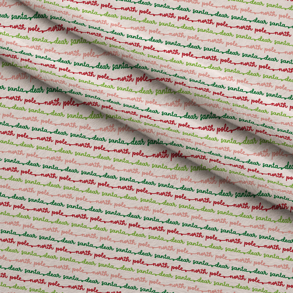 North Pole Post Pattern 1 Fleece Fabric — fleece fabric folded close-up preview (mv-fleece-v1:lying)