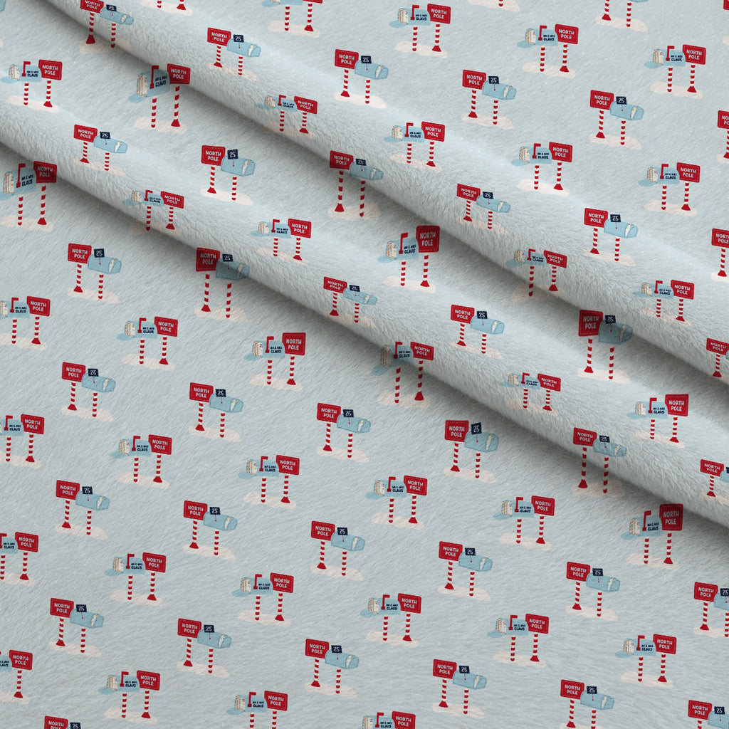 North Pole Post Pattern 13 Fleece Fabric — fleece fabric folded close-up preview (mv-fleece-v1:lying)