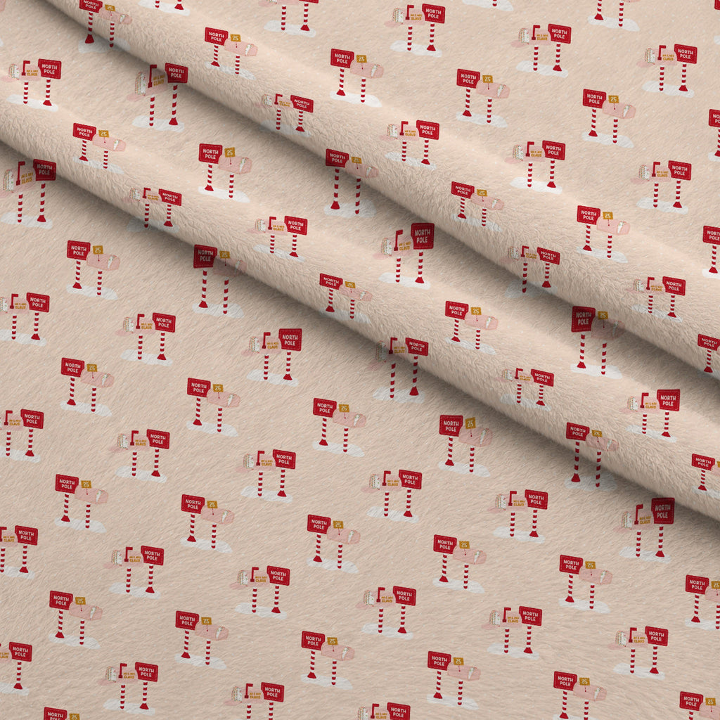 North Pole Post Pattern 5 Fleece Fabric — fleece fabric folded close-up preview (mv-fleece-v1:lying)