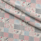 Patchwork Posies Pattern 17 Fleece Fabric — fleece fabric folded close-up preview (mv-fleece-v1:lying)