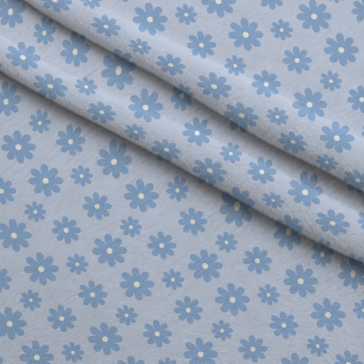 Periwinkle Dreams Daisies Fleece Fabric — fleece fabric folded close-up preview (mv-fleece-v1:lying)