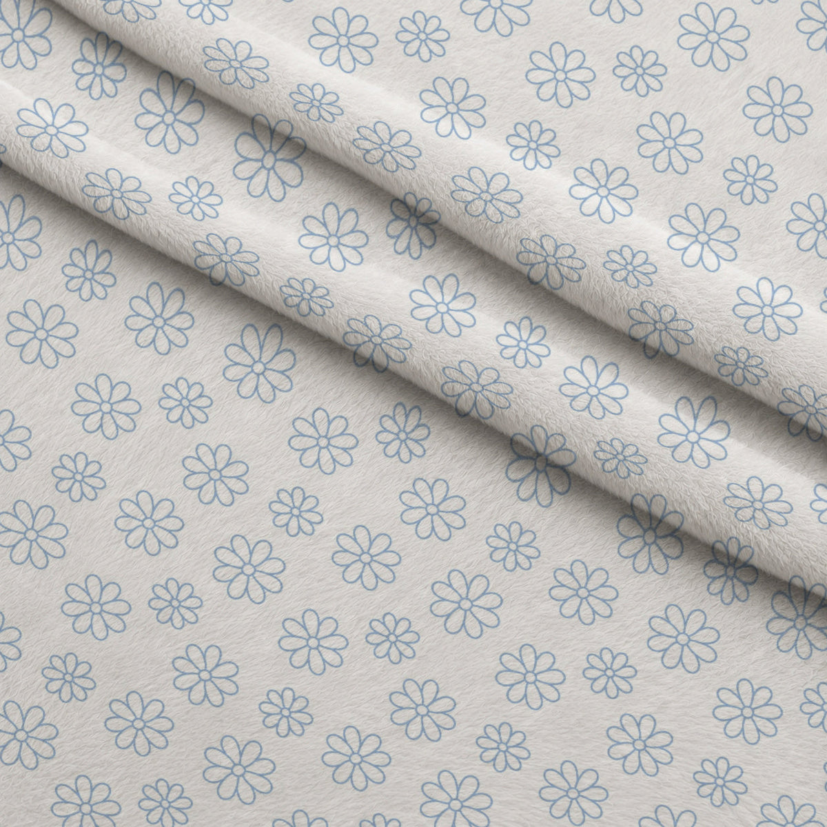 Periwinkle Dreams Daisies Outline on White Fleece Fabric — fleece fabric folded close-up preview (mv-fleece-v1:lying)