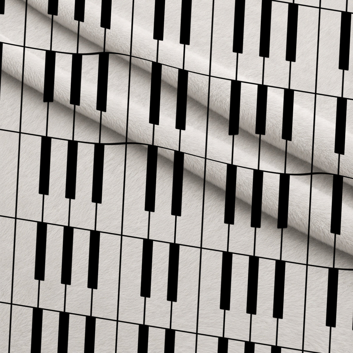 Piano Keys Fleece Fabric — fleece fabric folded close-up preview (mv-fleece-v1:lying)