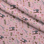 Pink Old Sewing Elements Fleece Fabric — fleece fabric folded close-up preview (mv-fleece-v1:lying)