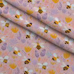 Pollen Parade Pattern 53 Fleece Fabric — fleece fabric folded close-up preview (mv-fleece-v1:lying)
