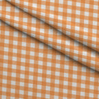 Pumpkin Gingham Pattern 6 Fleece Fabric — fleece fabric folded close-up preview (mv-fleece-v1:lying)