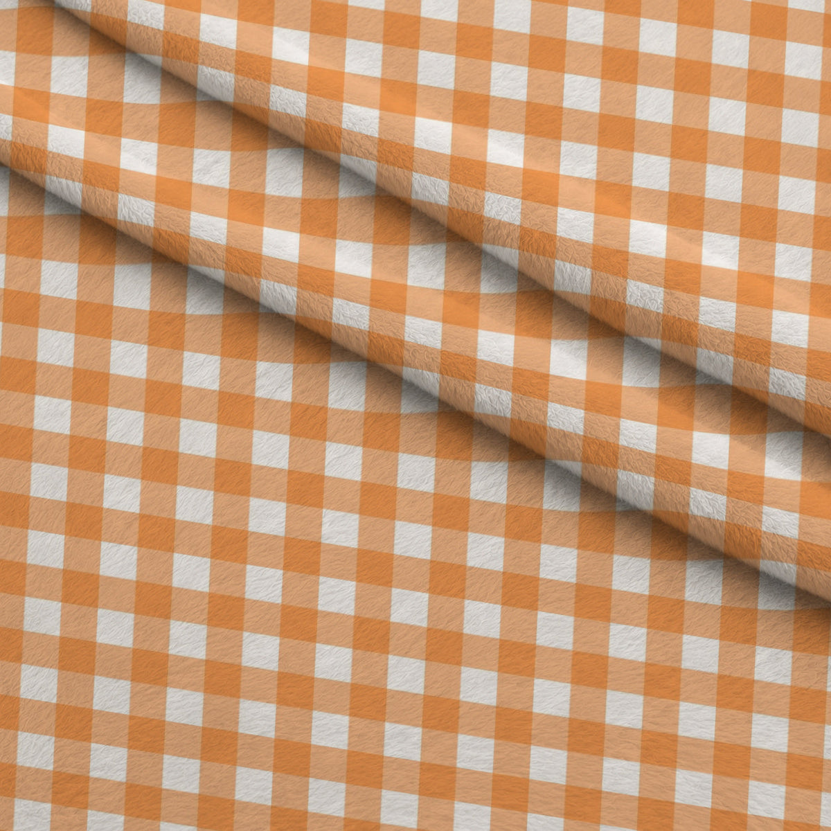 Pumpkin Gingham Pattern 6 Fleece Fabric — fleece fabric folded close-up preview (mv-fleece-v1:lying)