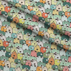 Puppy Pile Pattern 11 Fleece Fabric — fleece fabric folded close-up preview (mv-fleece-v1:lying)