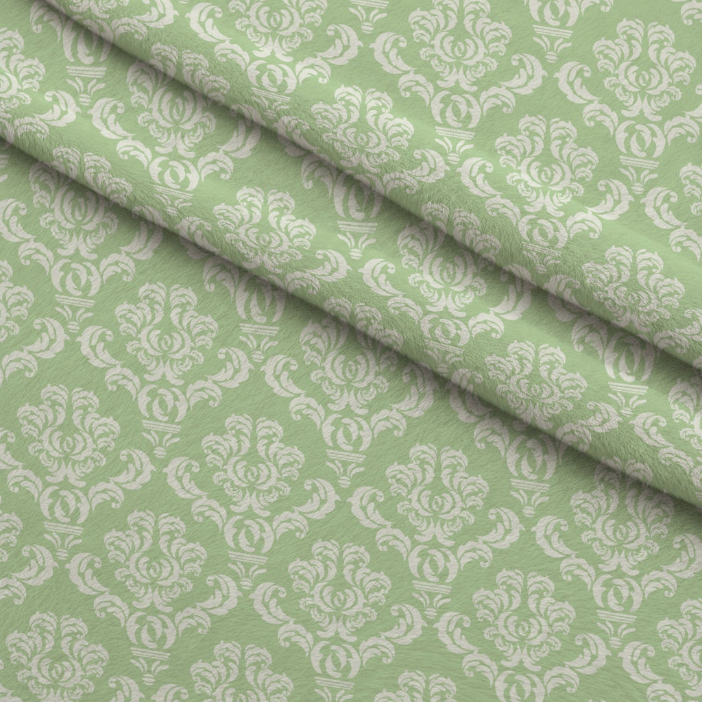 Simple Damask White on Green Fleece Fabric — fleece fabric folded close-up preview (mv-fleece-v1:lying)