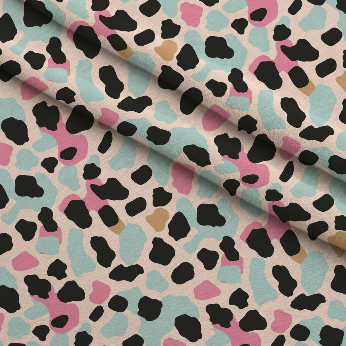 Sorbet Cheetah Spots Pattern 10 Fleece Fabric — fleece fabric folded close-up preview (mv-fleece-v1:lying)