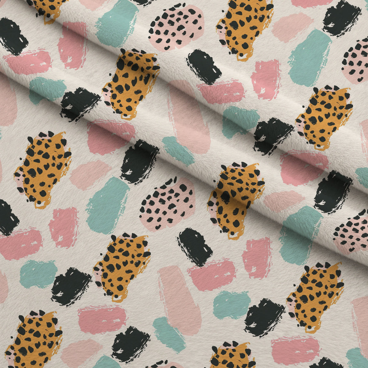 Sorbet Cheetah Spots Pattern 12 Fleece Fabric — fleece fabric folded close-up preview (mv-fleece-v1:lying)