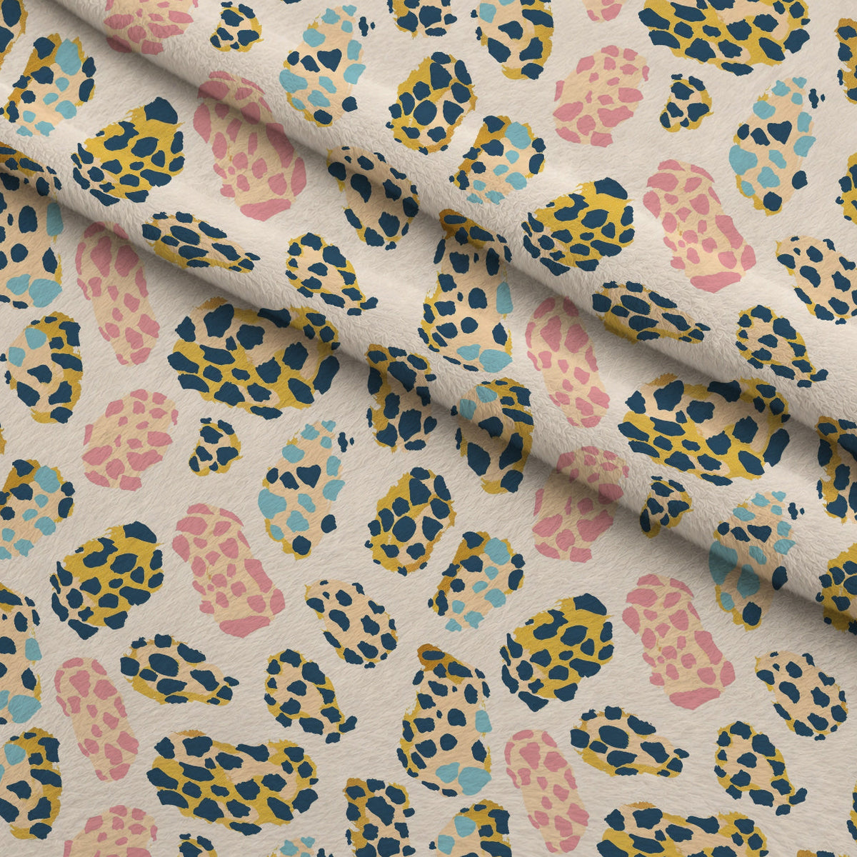 Sorbet Cheetah Spots Pattern 13 Fleece Fabric — fleece fabric folded close-up preview (mv-fleece-v1:lying)
