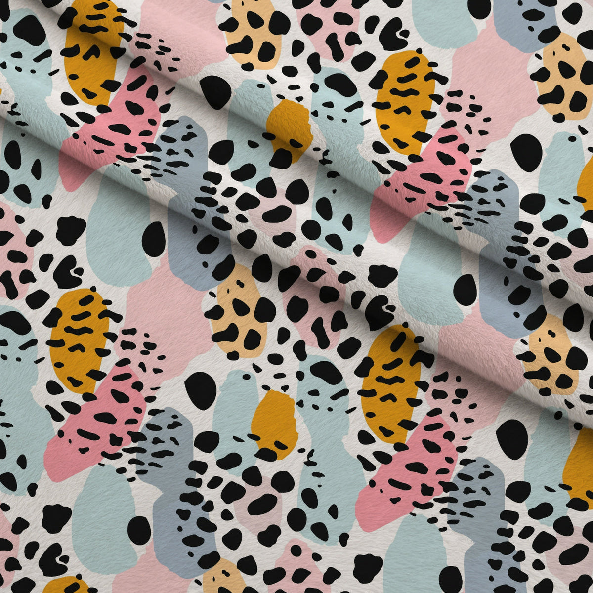 Sorbet Cheetah Spots Pattern 15 Fleece Fabric — fleece fabric folded close-up preview (mv-fleece-v1:lying)
