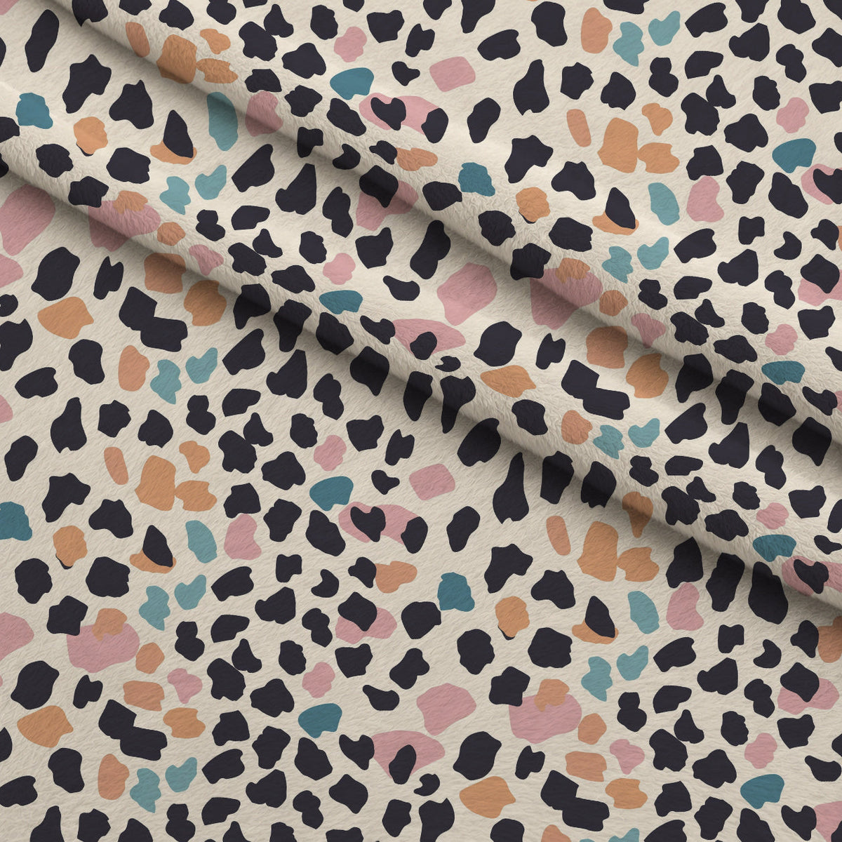 Sorbet Cheetah Spots Pattern 17 Fleece Fabric — fleece fabric folded close-up preview (mv-fleece-v1:lying)