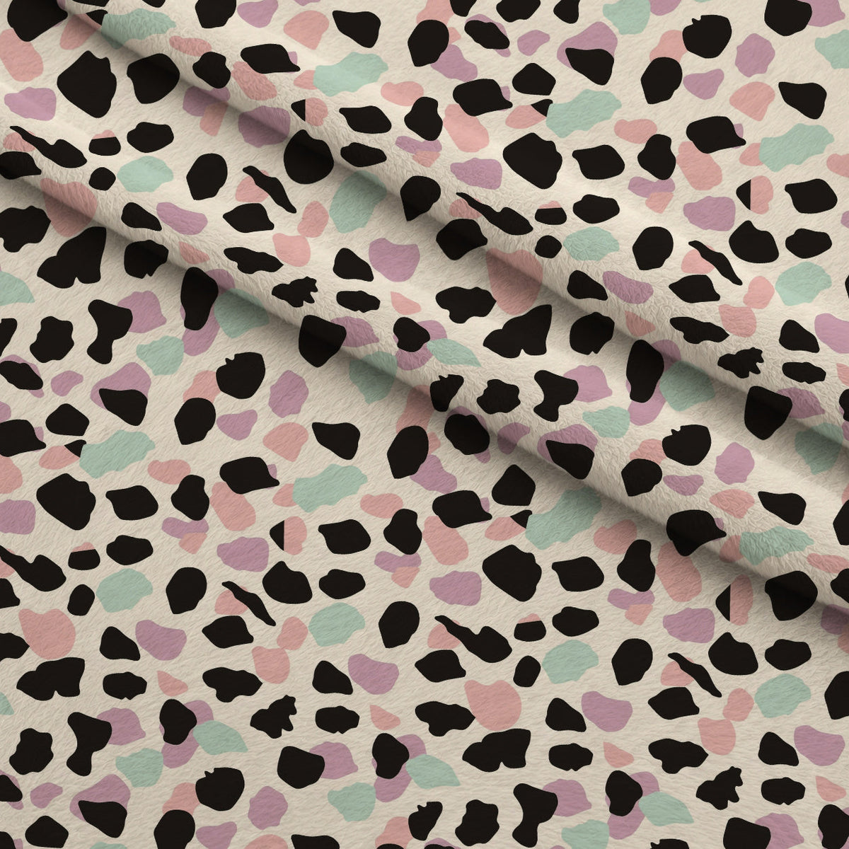 Sorbet Cheetah Spots Pattern 18 Fleece Fabric — fleece fabric folded close-up preview (mv-fleece-v1:lying)
