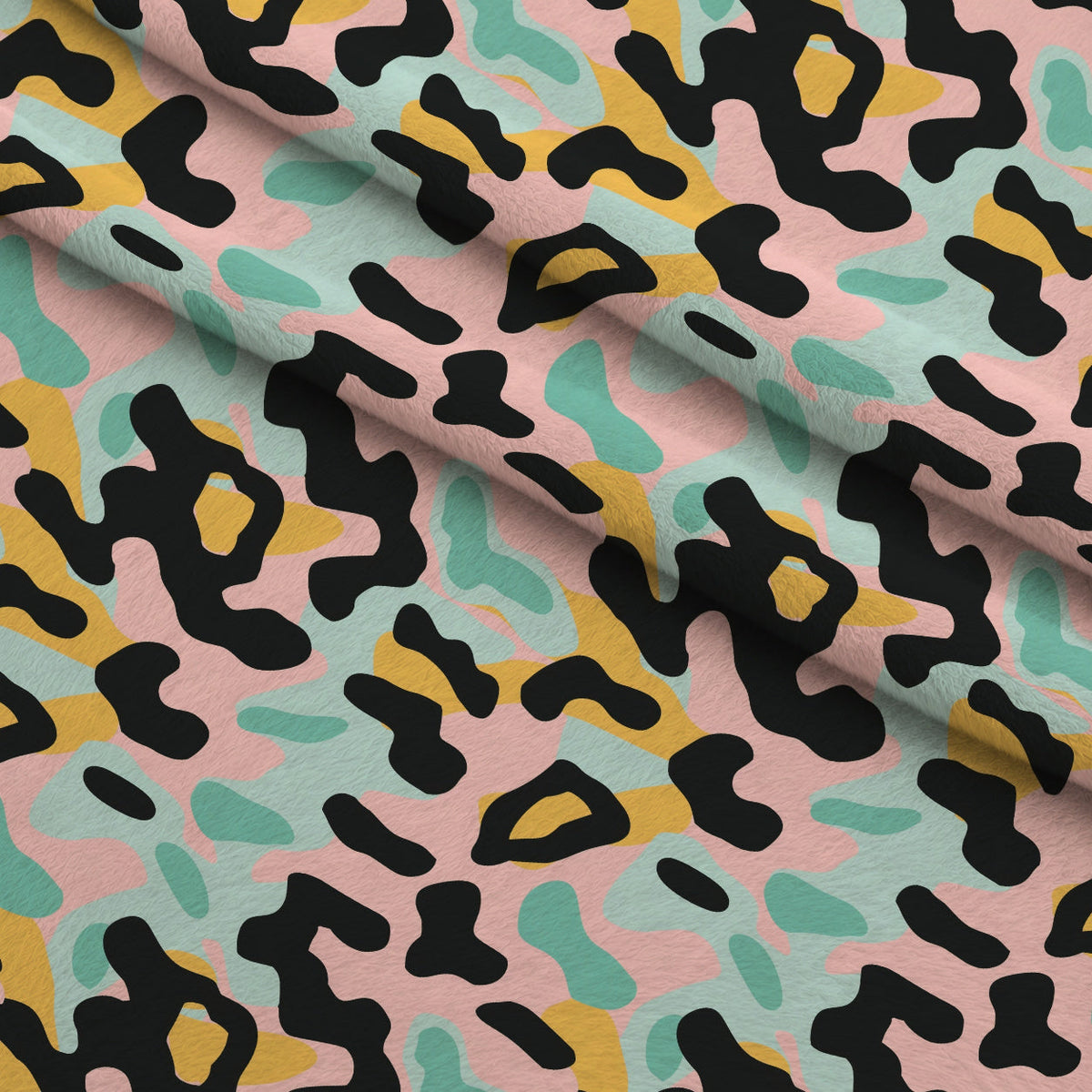 Sorbet Cheetah Spots Pattern 20 Fleece Fabric — fleece fabric folded close-up preview (mv-fleece-v1:lying)