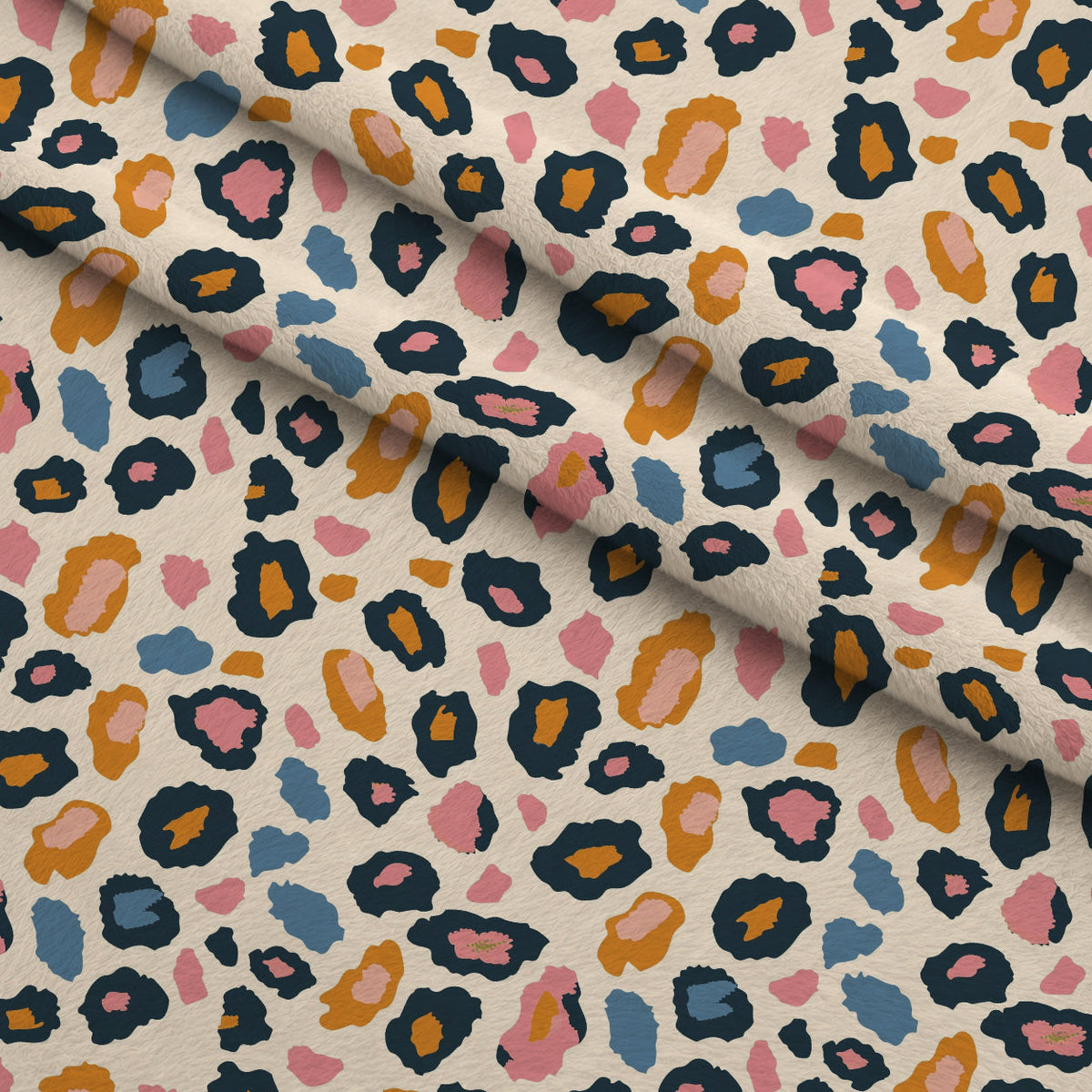 Sorbet Cheetah Spots Pattern 4 Fleece Fabric — fleece fabric folded close-up preview (mv-fleece-v1:lying)