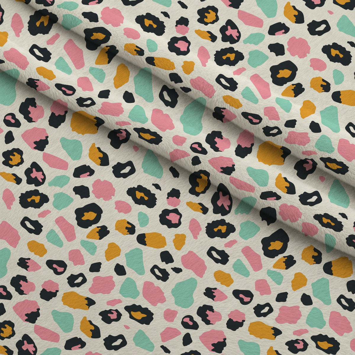 Sorbet Cheetah Spots Pattern 5 Fleece Fabric — fleece fabric folded close-up preview (mv-fleece-v1:lying)