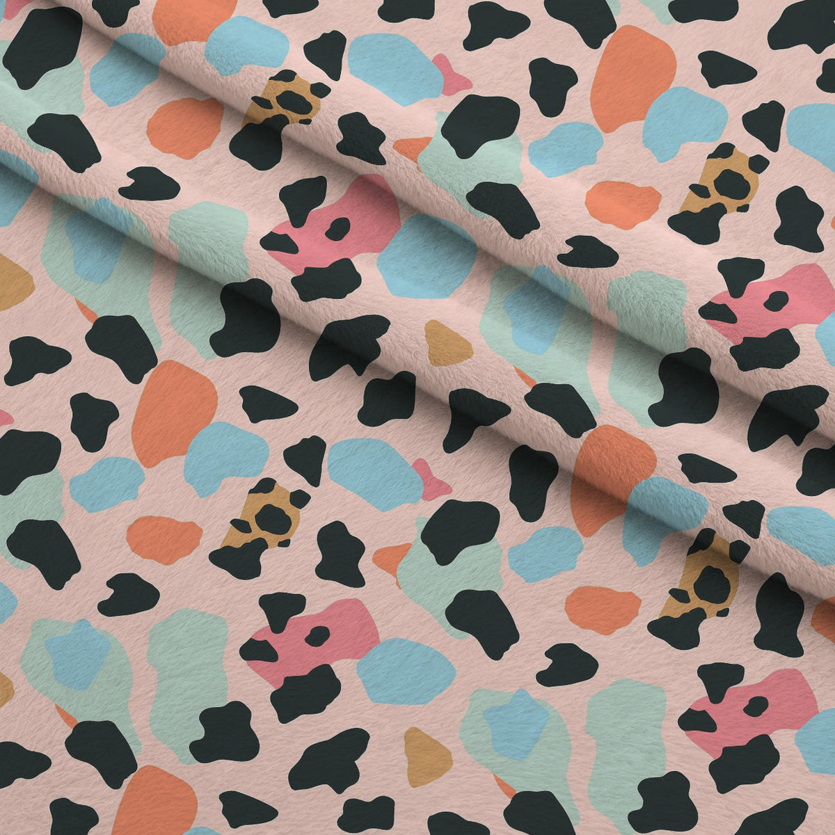 Sorbet Cheetah Spots Pattern 7 Fleece Fabric — fleece fabric folded close-up preview (mv-fleece-v1:lying)