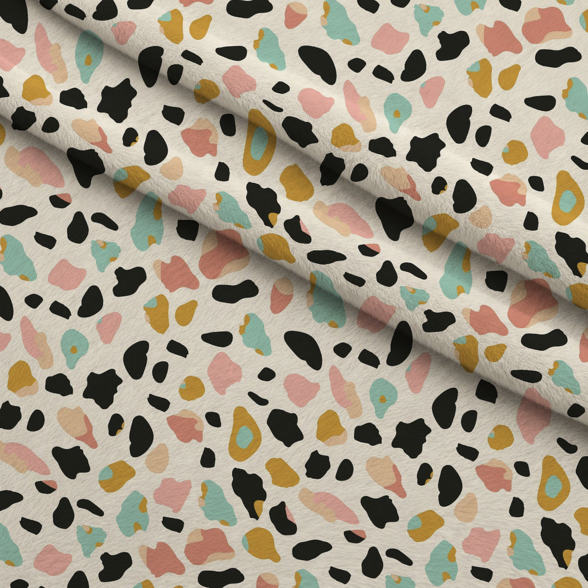 Sorbet Cheetah Spots Pattern 8 Fleece Fabric — fleece fabric folded close-up preview (mv-fleece-v1:lying)