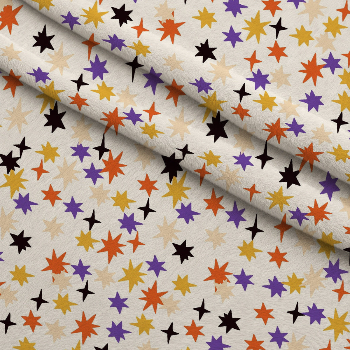 Spooky Sweets Pattern 1 Fleece Fabric — fleece fabric folded close-up preview (mv-fleece-v1:lying)