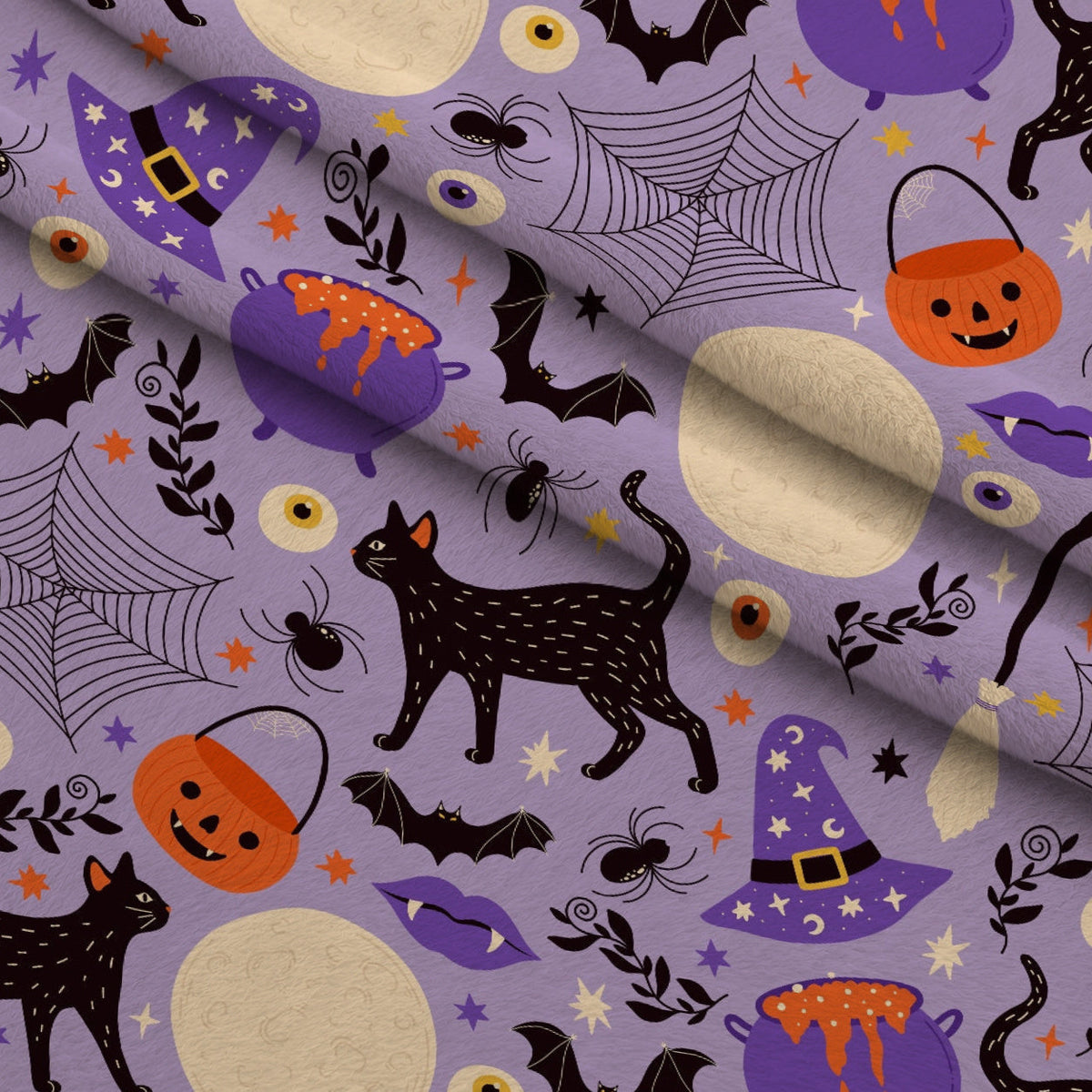 Spooky Sweets Pattern 4 Fleece Fabric — fleece fabric folded close-up preview (mv-fleece-v1:lying)