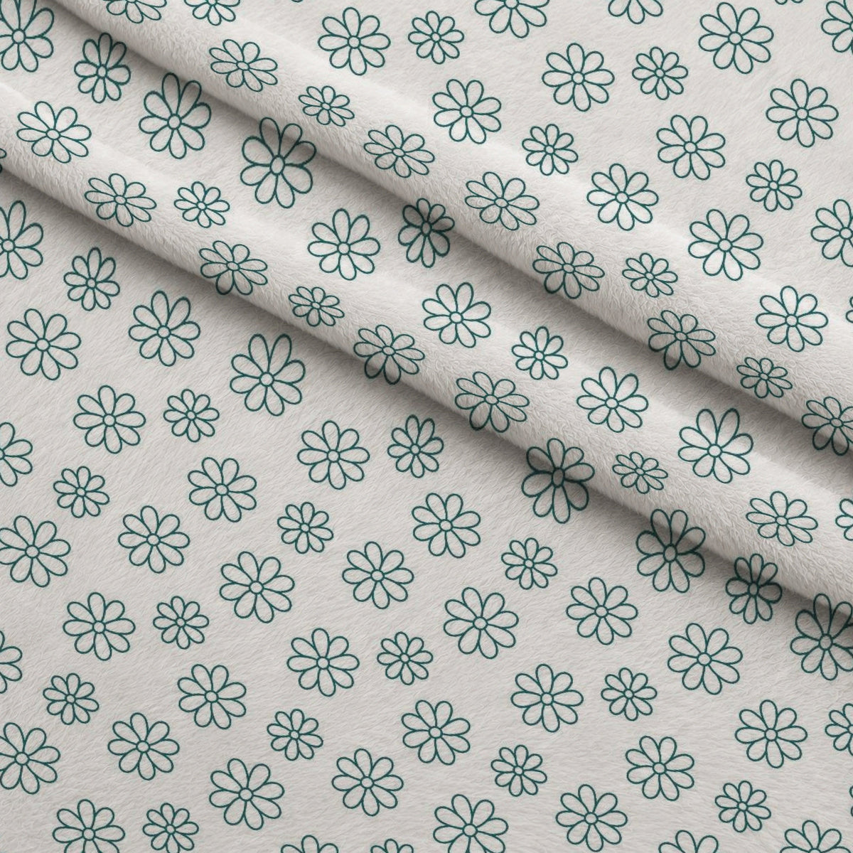 Teal Daisies Outline Fleece Fabric — fleece fabric folded close-up preview (mv-fleece-v1:lying)