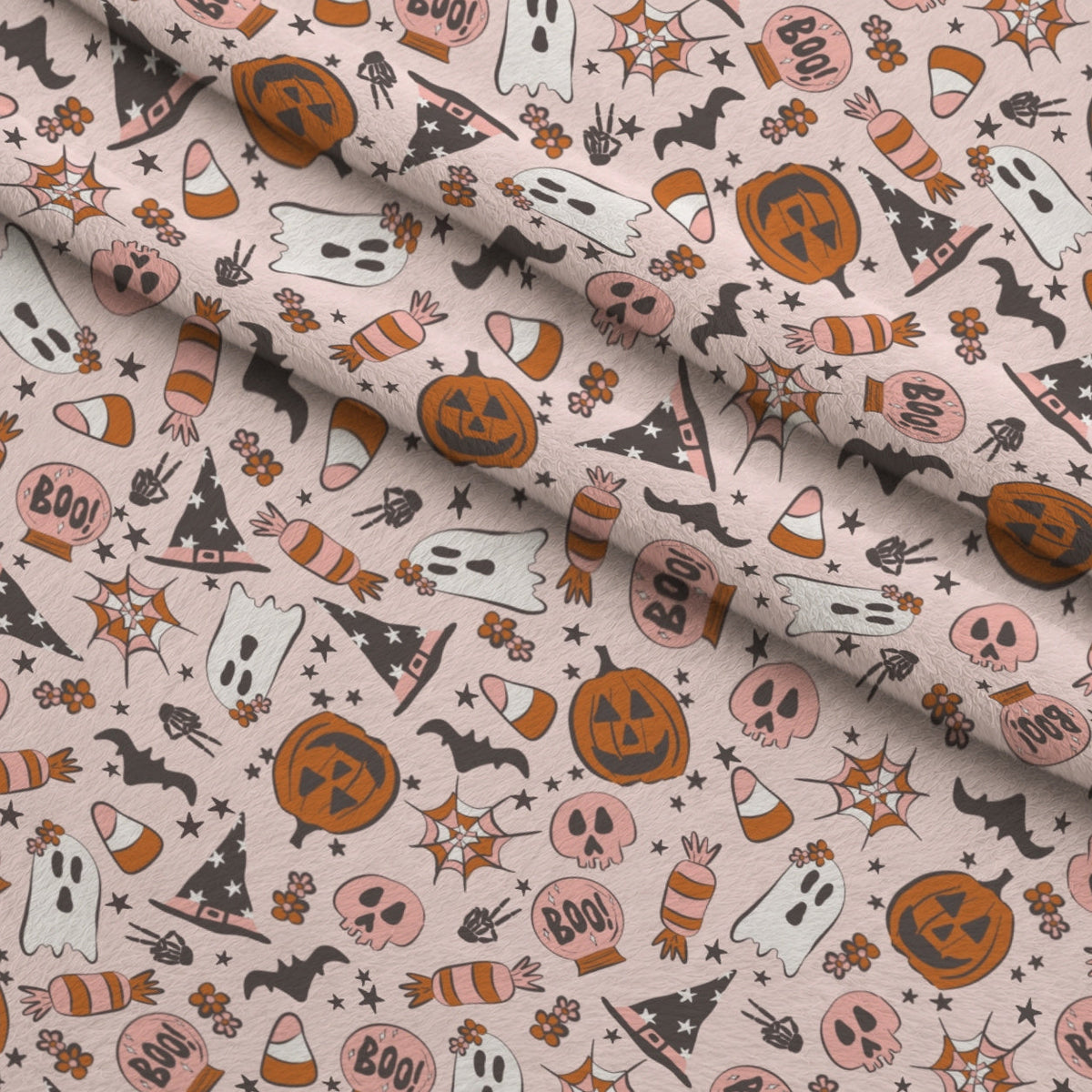 Trendy Pastel Halloween Fleece Fabric — fleece fabric folded close-up preview (mv-fleece-v1:lying)