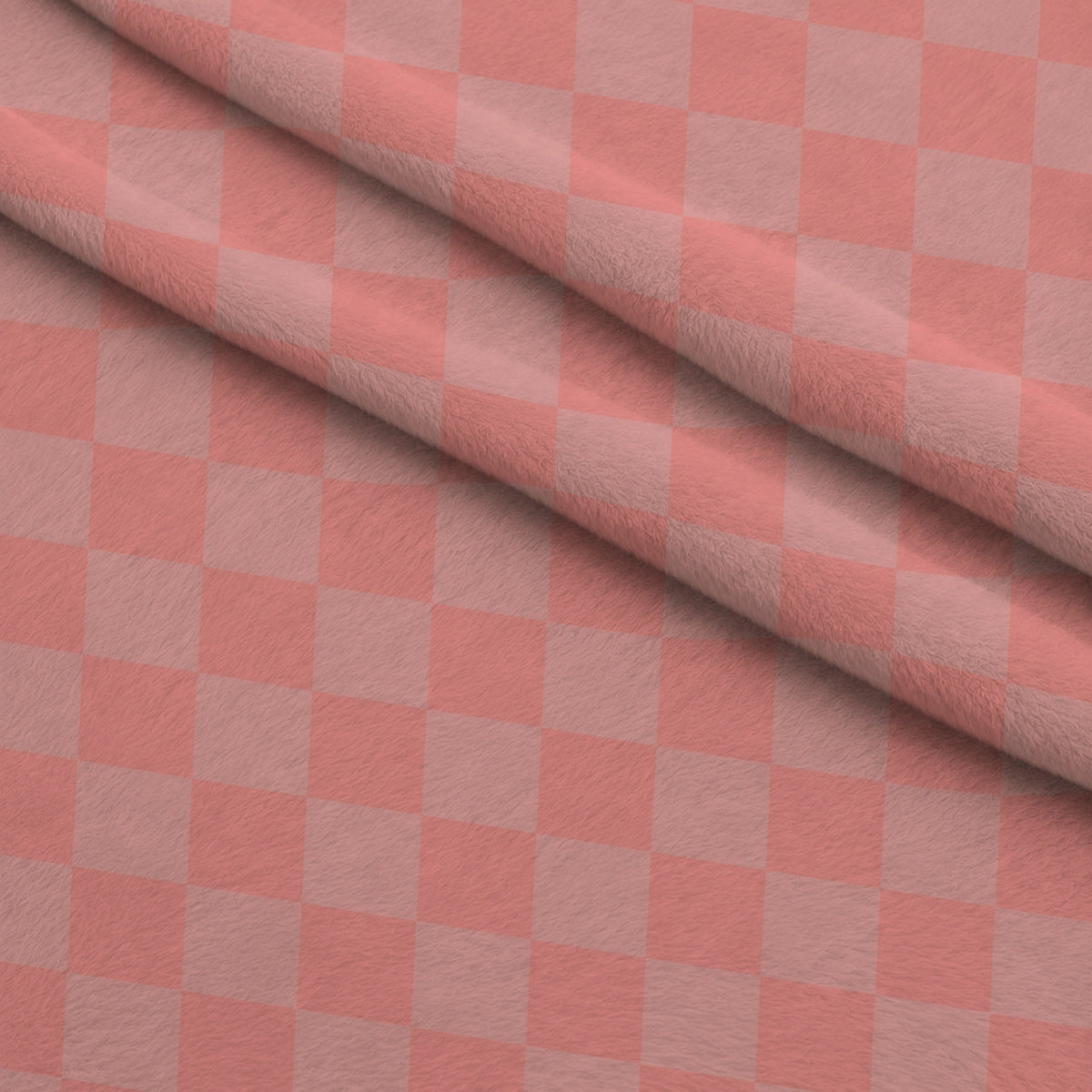 Two Tone Checkered Peach Puff Fleece Fabric — fleece fabric folded close-up preview (mv-fleece-v1:lying)